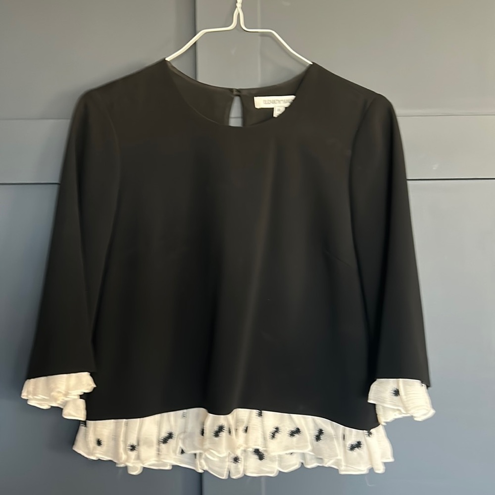 Elizabeth and James swing top